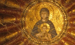 circular golen mosaic of madonna and child