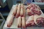 pigs trotters in a Greek meat market