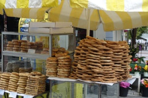 yellow street stall in Athens selling bread rings